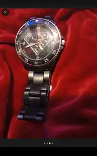 BRAND-NEW SUPERMAN WATCH still has the plastic protector on