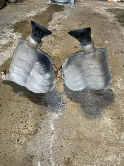 Pair of original mopar mufflers in good condition with 5 inch diameter black tips no rust holes fits...
