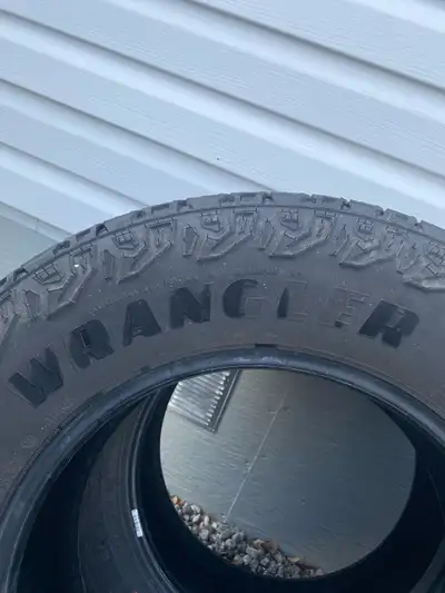 Territory AT, M+S, P265/65R18. Approx. 6,500kil. on tires,excellent condition.