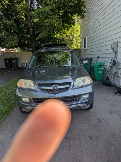 Selling a used Acura MDX, a reliable SUV perfect for families. It features a spacious interior and a...