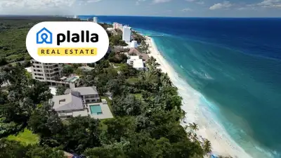 An exclusive beachfront residential development in Cozumel, offering luxury condos and penthouses wi...