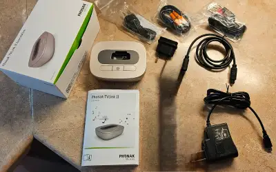 Brand new Phonak TVLink II for Hearing Aids. The TVLink II is used with a streaming device, ie Phona...