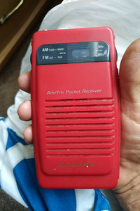 Vintage Lloyds Transistor Pocket Radio with Belt Clip Red