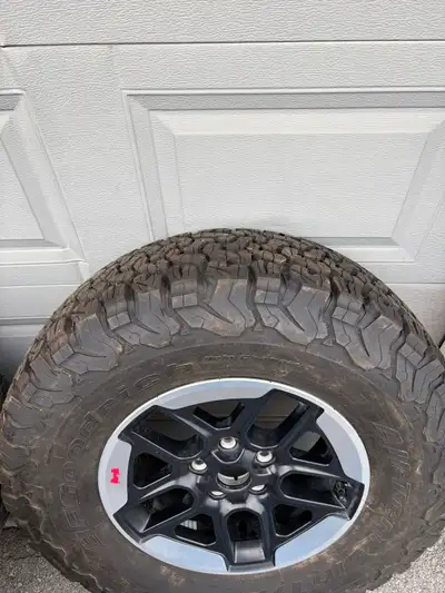 Selling a set of five used Jeep factory rims with BFGoodrich All-Terrain tires. These rims are in go...