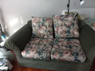Clean dark green loveseat sofa$100., View more