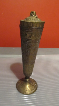 Antique engraved brass 7" high vase with lid.