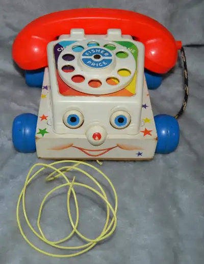 Vintage Fisher‐Price Chatter Telephone (Wood Base, 1965–67), View more