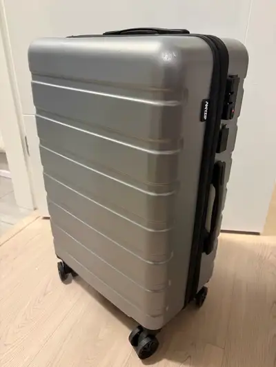 Hardshell suitcase (24”) with USB charging port and TSA Lock, View more