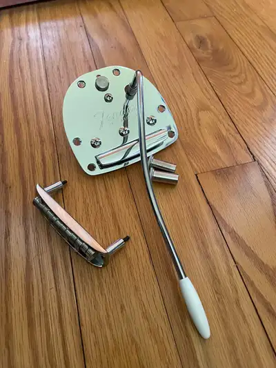 Genuine Fender American Professional Jazzmaster/Jaguar tremolo assembly and bridge from an American...