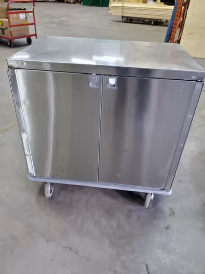 Stainless Steel Storage Cabinet W/ Double Doors Very nice stainless steel cabinet with lots of uses....