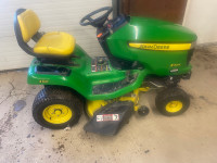 2013 John Deere X304 and attachments