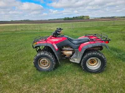 2003 honda fm 4-tracks. 350cc, new mud lite tires. $3500 or best offer, call or only at 403 352 3549...