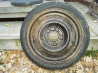 Space Saver Donut Tire for General Motors vehicle