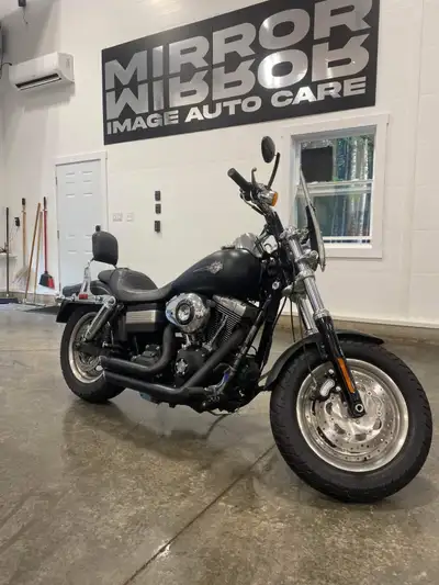 This one owner 2011 Harley-Davidson Fat Bob features a bold, matte black finish and is powered by a...