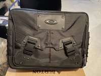 Two  Oakley computer bags
