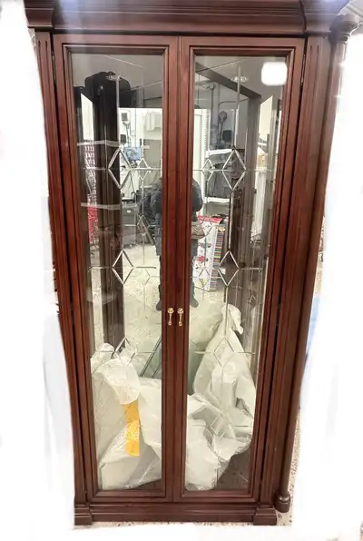 Corner curio/display cabinet with glass doors and shelves, View more
