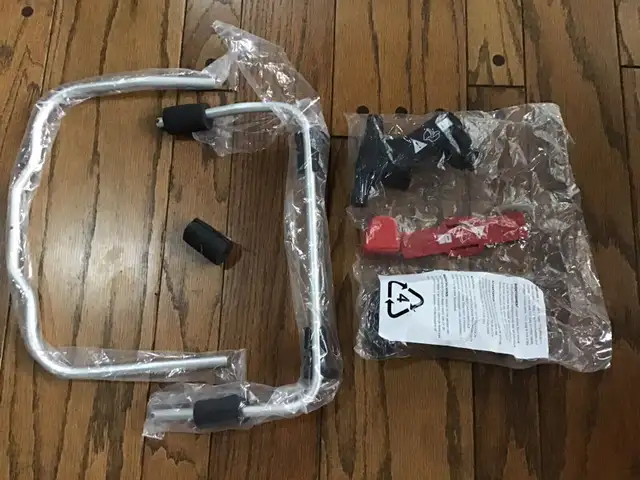THULE spring car seat adapter (Chicco) model 11300411 in Strollers, Carriers & Car Seats in Dartmouth - Image 4