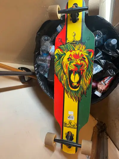 Skate Board. Long board. 3 ft long. Little wear and tear. Good condition