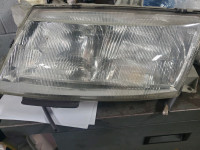 Saab 95 left  headlight 