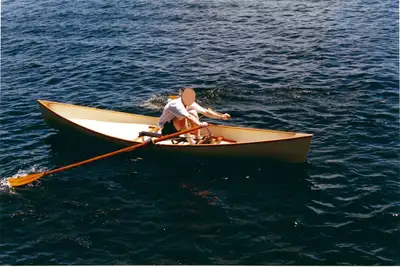 Custom sliding-seat rowing skiff (canoe hull) from Kingfisher Canoe Centre. Its design is based on t...