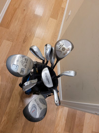 Kids assorted golf clubs with bag.