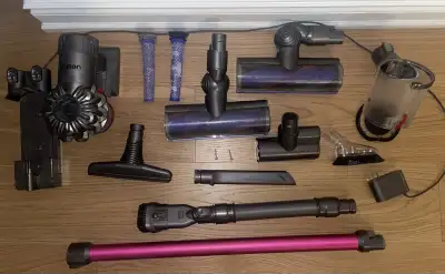 Used V6 Animal Dyson vacuum, ideally for parts and the accessories, but still operates (with special...