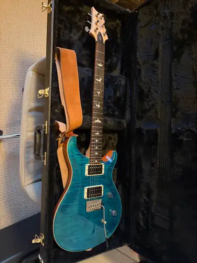 Considering trading my 21 PRS CE24, guitar plays great with no problems, frets are in great shape. O...