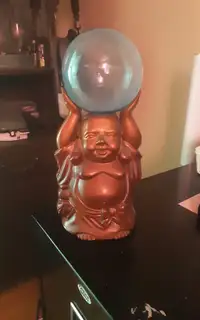 Smiling Buddha lamp