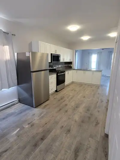 Spacious, bright and extensively renovated 2-bedroom, 1.5-bath home offering approximately 1,200 sq....