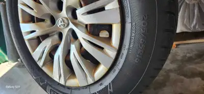 Motomaster tires, winter edge Used 2 season, a lot left of tread On rims with caps