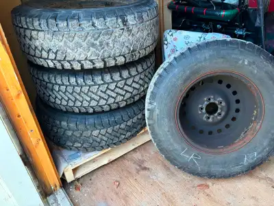 Used studded tires with rims. Sold truck. No longer need. 255/70R16