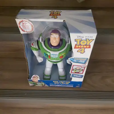 Toy story 4 Buzz lightyear 12 inch electronic figure. Original box. Batteries still good. Figure nea...