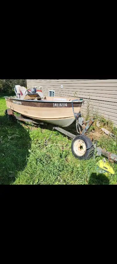 14.5' Sylvan Super Snapper aluminum boat with a 50 HP Evinrude and trailer. Live well, fish finder,...