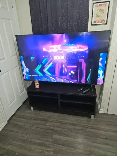 Samsung 65 inch Smart TV with stand. serious inquiries only, View more