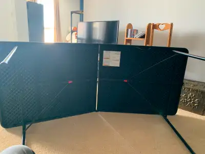 Black folding table model NT5183. Like new.