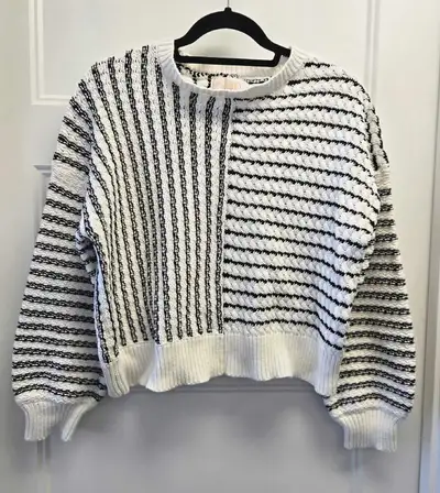 Add a touch of chic to your wardrobe with this Audrey Parks sweater, a size large featuring a stylis...
