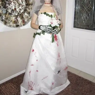 This is a St Patrick’s strapless designer gown with cathedral train originally $1,500. I took in the...