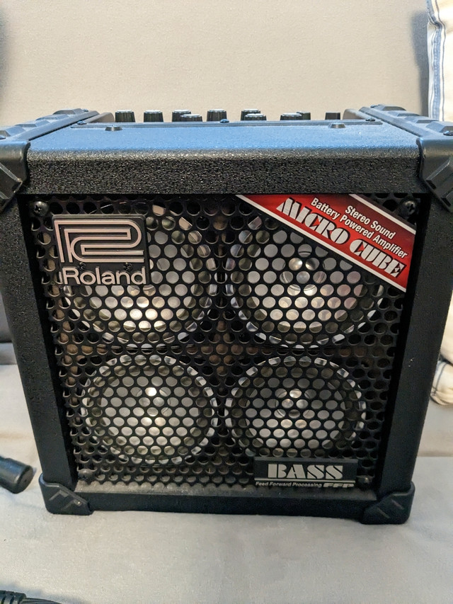 Fender squire bass guitar and Roland micro cube bass amp Guitars