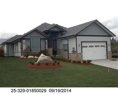 This upscale executive home features 3 bedrooms and 3 bathrooms, a fenced backyard, and a double gar...
