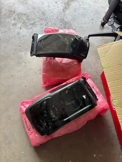 Tinted Dodge Ram Headlights. From a 2008 Dodge Ram, third gen. Other than the clear coat starting to...
