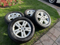 4 Chrysler Town and Country tires and OEM rims. 