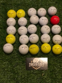 25 Taylormade and 25 Callaway assorted golf balls