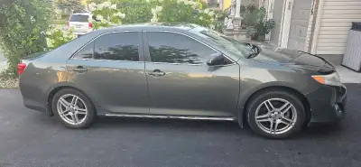 XLE Toyota camry, excellent condition. Green and beige leather seats. Heated seats, power windows, a...