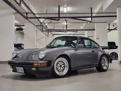 For sale is our 1986 Porsche 911 3.2 Carrera coupe in Meteor Grey Metallic with a Grey Beige interio...