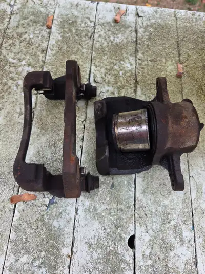 Piston is out. Took it off toyota corolla 2014. It was sticking on inside. Boot is still good. Text...