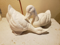 Various paintable ceramic bisque pieces including some Christmas
