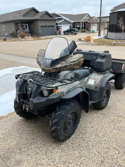 Includes thumb warmer, grip warmer, gun boot, deluxe ATV cargo box, 2500 lb. winch.