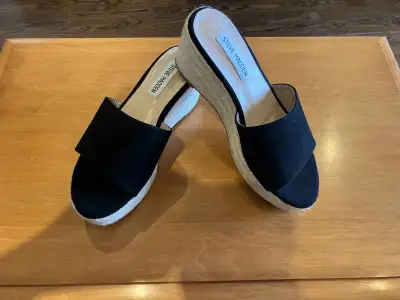 Women’s size 7-7.5 (European 38) black espadrille wedge slides by Steve Madden in like new condition