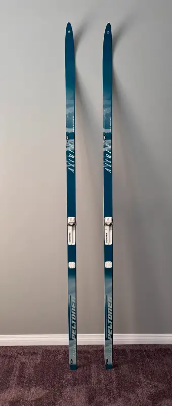 Make an offer Peltonen Alture Crosscountry skis with Old style profile bindings Used but in good con...
