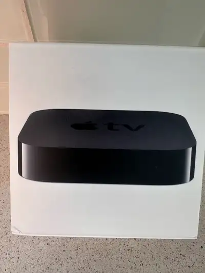 Never been opened Apple TV box (model A1469) is the 3rd generation, Rev A Apple TV, also called Appl...